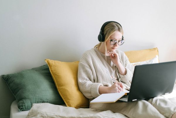 A woman working on a laptop